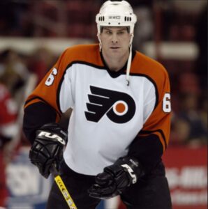 Chris Therien Northeast Catholic Alumni Outstanding Service and achievement award Philly Philadelphia Flyers Association addiction bundy recovery mental health